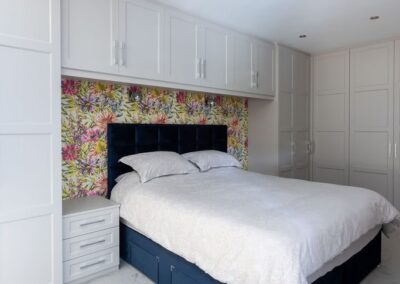 Image of bedroom with fitted wardrobes and cupboards