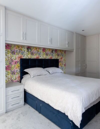 Image of bedroom with fitted wardrobes and cupboards