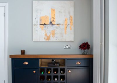 Image of a bespoke sideboard with drawers and a wine rack