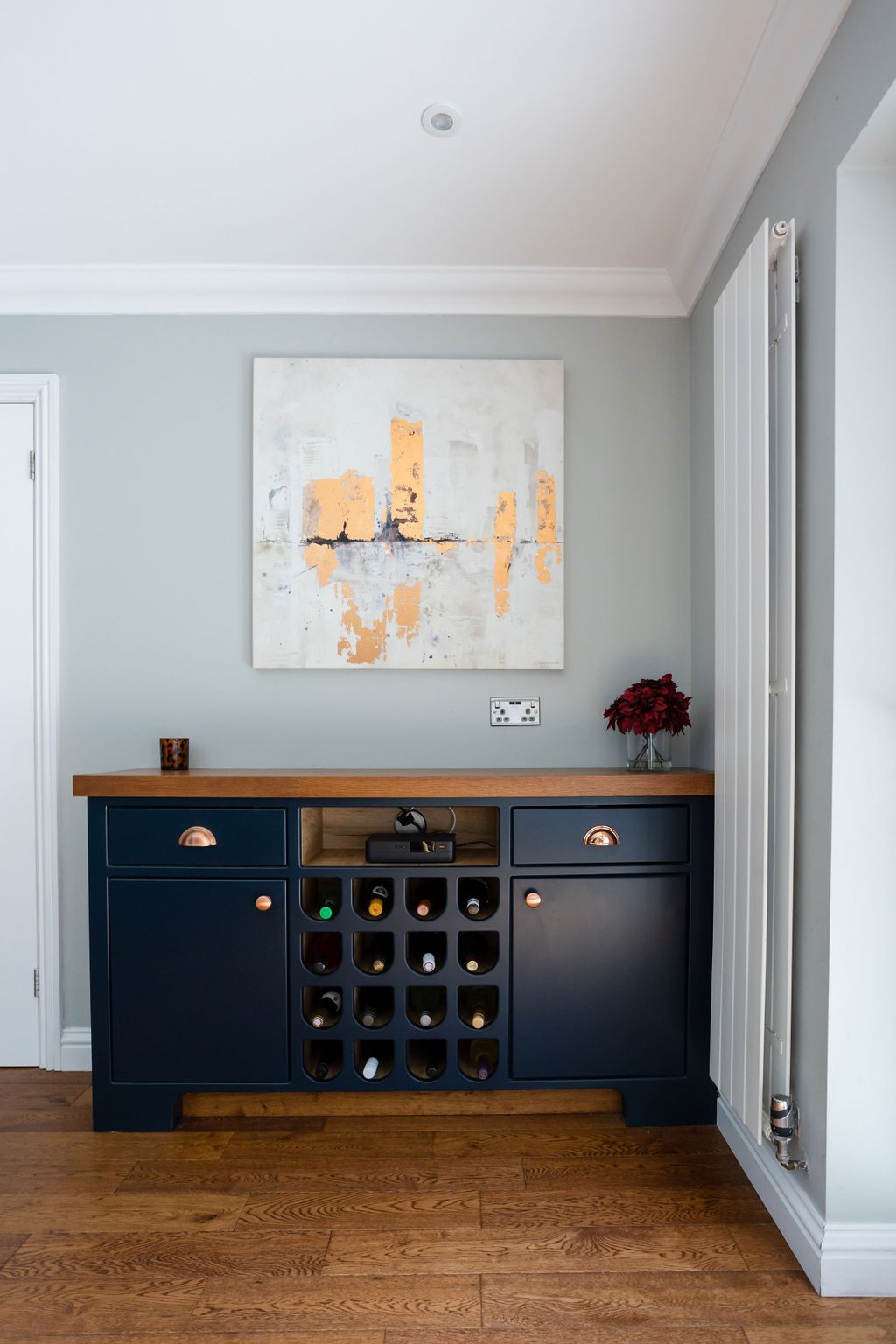 Image of a bespoke sideboard with drawers and a wine rack