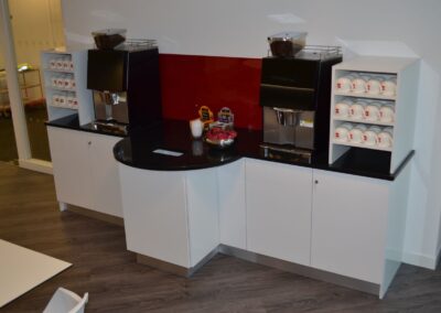 Image of a corporate office coffee point unit and shelves