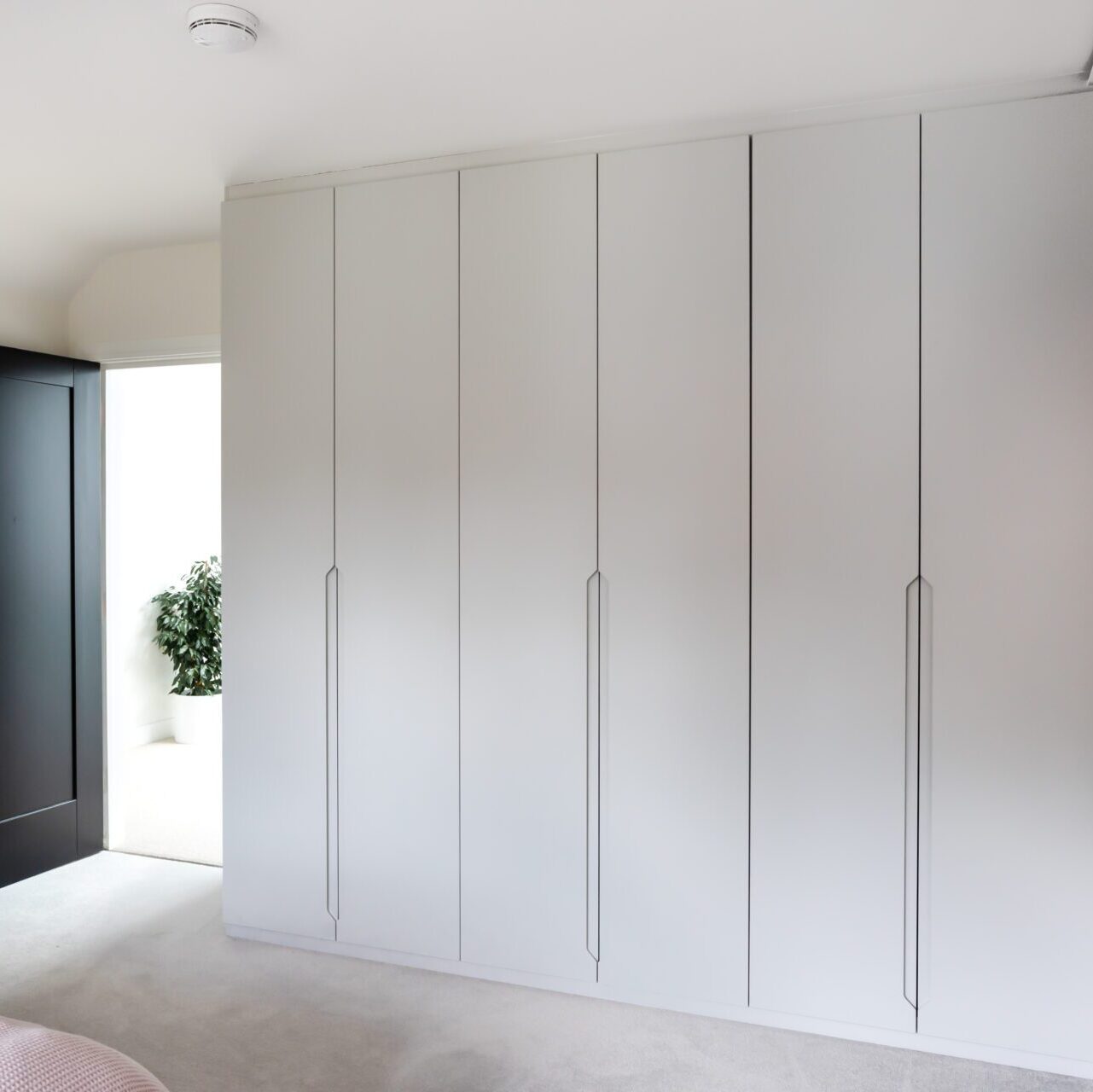 Image of white fitted hinged wardrobes